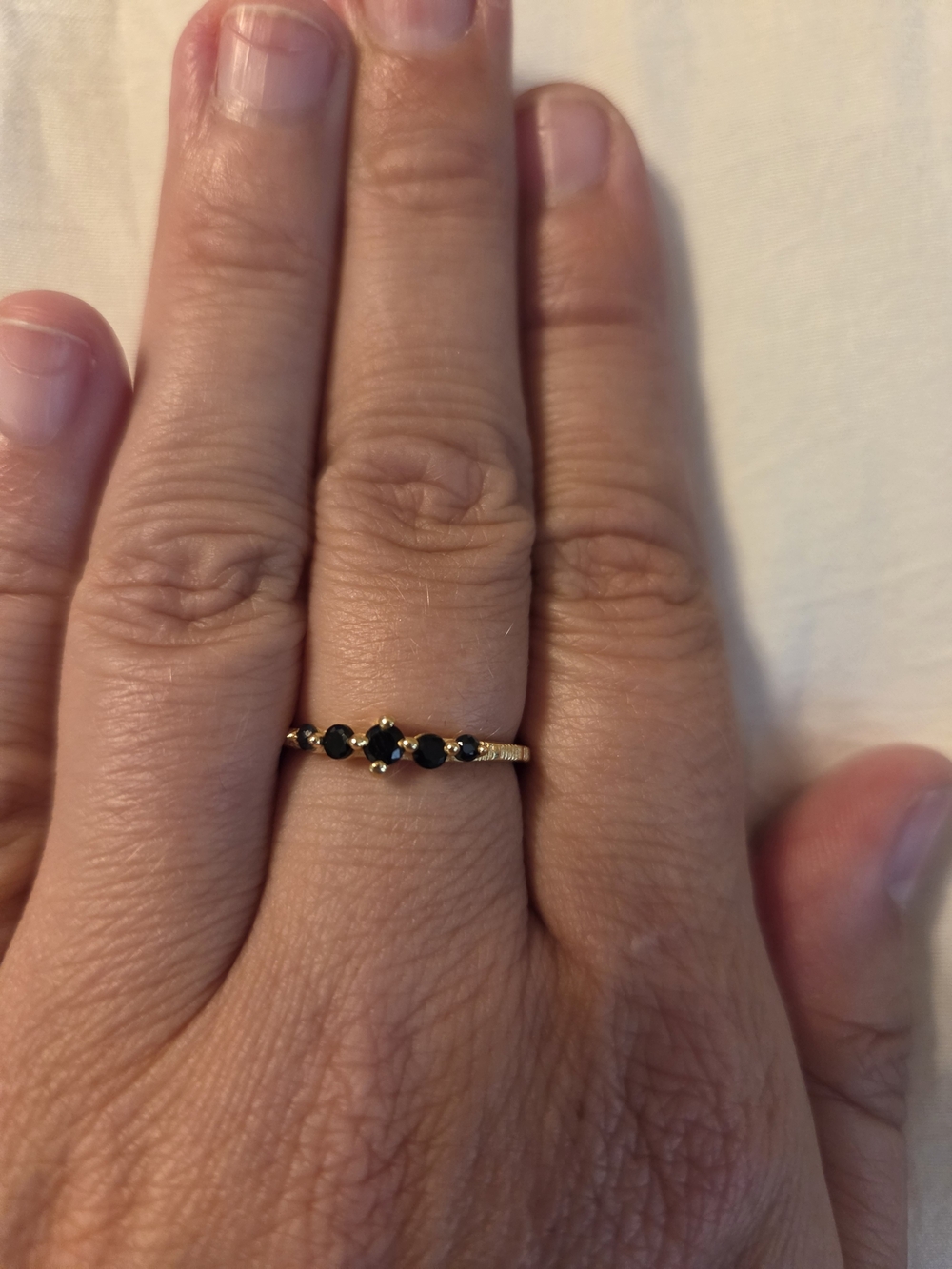 Gold Ring with Black Stones - Elegant Women's Jewelry